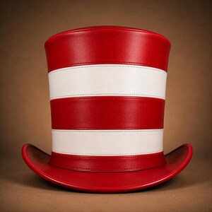 May include: A tall top hat featuring alternating horizontal stripes of red and white. The hat has a smooth, structured finish with a curved brim at the base and visible stitching along the seams where the red and white sections meet.