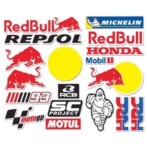 Op de afbeelding: Een verzameling motorrace-stickers met logo's voor Red Bull, Repsol, Honda, Michelin, Mobil 1, RCB, SC Project, Motul en MotoGP. Het vel bevat rode stier-silhouetten, gele cirkels, het nummer 93 en de Michelin-mannetje-figuur.