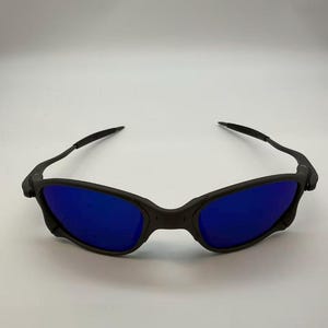Gafas de sol polarizadas Oakley Juliet 2.0 X-Metal con lentes azules y montura gris mate imagen 1