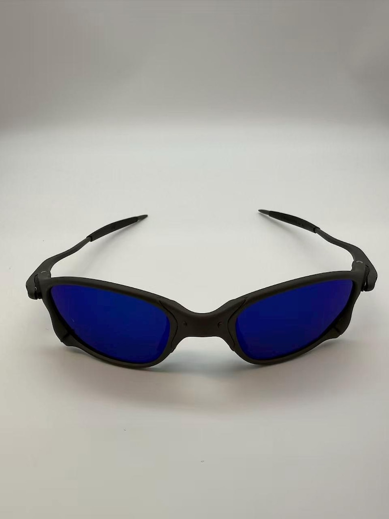 Gafas de sol polarizadas Oakley Juliet 2.0 X-Metal con lentes azules y montura gris mate imagen 1