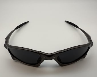 Gafas de sol Oakley Penny & Juliet X-Mental con montura gris y lentes negras