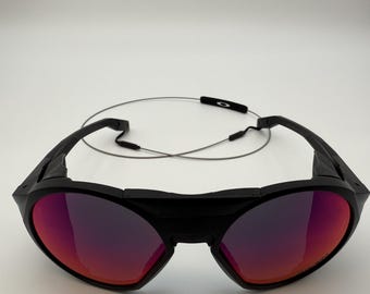 Oakley CLIFDEN OO9440 Matte Black Round Ruby Lens Sunglass New