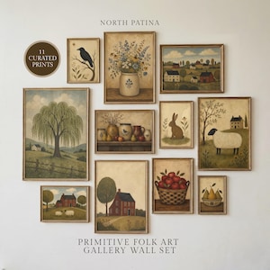 May include: A collection of 11 framed art prints labelled North Patina Primitive Folk Art Gallery Wall Set. The prints feature rural scenes including a crow, a floral vase, a landscape with houses, a willow tree, pottery, a rabbit, a sheep, a house, a basket of apples, and a bowl of pears.