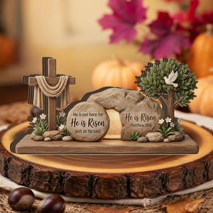 May include: A white ceramic mug with a black handle and the text "But First, Coffee" in a handwritten style. The mug is on a white surface. The mug is 4 inches tall.