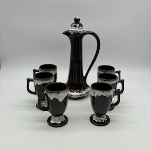 May include: A rustic wooden sign with the text "Welcome to our home" in a handwritten style. The sign features a distressed finish and a simple, inviting design, perfect for a front porch or entryway.