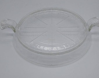 Vintage Fire King-Anchor Hocking Glass que sirve plato caliente con manijas ornamentadas