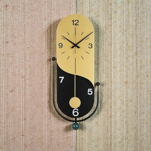 Reloj de pared de péndulo moderno, minimalista, negro y dorado, silencioso, de estilo nórdico. Reloj de pared de diseño creativo para la decoración del hogar y la sala de estar.