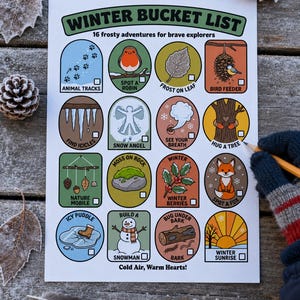 May include: A white paper sheet titled Winter Bucket List with 16 colorful circular and rectangular icons depicting frosty activities like animal tracks, a robin, snow angels, and a snowman, each with a small checkbox for tracking progress.