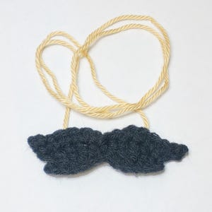 Mustache on a String