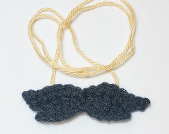 Mustache on a String