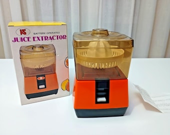 Vintage-Entsafter im futuristischen Design der 1970er Jahre. Gebraucht, in Originalverpackung.