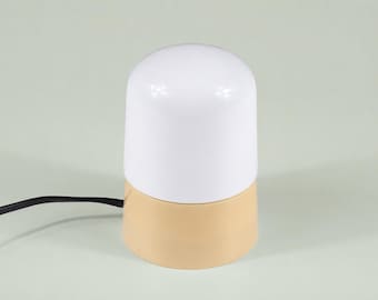 Vintage 1960s table lamp pill-shaped, opal glass with apricot plastic base, RZB style