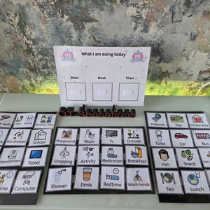 May include: A visual schedule board with the text "What I am doing today." Includes picture cards for daily activities like brushing teeth, school, and playtime. The board is designed for organizing and visualizing a daily routine.