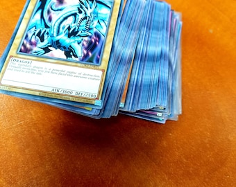 Yu-Gi-Oh! Card Bundle – 100 Common, 12 Super Rare & 8 Holo Collector-Ready Cards in Sleeves