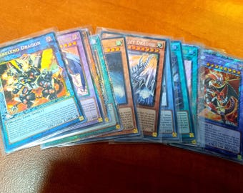 15 Secret and Starlight Rare Yu-Gi-Oh Cards Bundle – Sleeved Collectible Lot – Perfect for Decks & Collectors!