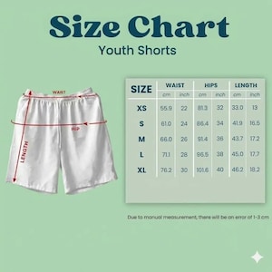 May include: White youth shorts with a drawstring waist, displayed with a size chart. The chart provides measurements in inches and centimeters for waist, hips, and length, ranging from XS to XL. The shorts are shown with measurements for waist, hip, and length.