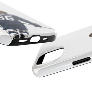 May include: White phone case with a black border. The case features a hockey player in a blue and white uniform. The player's number 66 is visible on the jersey. The case is designed to protect the phone.