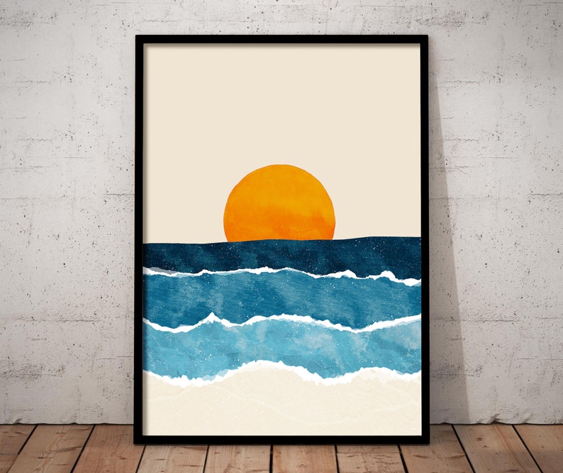 May include: Abstract art print featuring a large orange sun setting over a blue and white ocean. The print has a minimalist style and is perfect for a modern home.