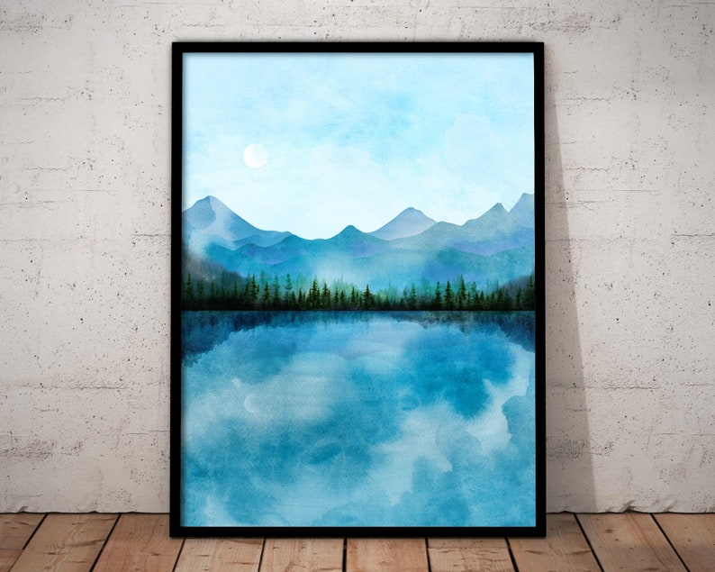 May include: A watercolor painting of a mountain range reflected in a still lake. The sky is a light blue with a single white cloud. The mountains are a dark blue and the lake is a light blue.