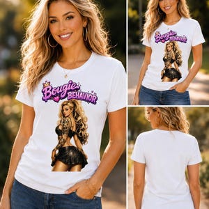 May include: A white short-sleeved t-shirt featuring a graphic print of a person with long blonde hair, tattoos, and a black outfit. Above the figure, the text reads Bougie Behavior in purple and pink lettering with a small crown and heart icon.