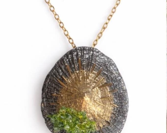 Silver pendant with bronze and gold plating, olivine stone, and limpet shape, gift for women