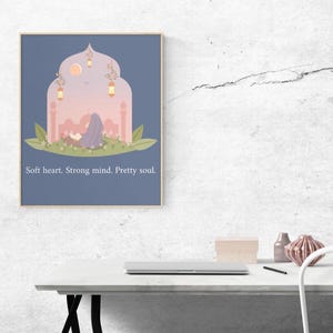May include: A rectangular wall art print featuring a purple background with a central archway illustration. Inside the arch, a figure sits on green grass reading, with hanging lanterns and a moon above. The text reads: Soft heart. Strong mind. Pretty soul.