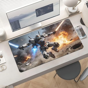 May include: A rectangular mousepad featuring a dynamic illustration of a robot warrior with glowing swords and a jetpack, set against a backdrop of an explosion. The robot is primarily white, blue, and gray.