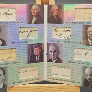 May include: A commemorative display card featuring portraits and handwritten document fragments of eight U.S. Presidents: George Washington, Thomas Jefferson, Abraham Lincoln, Theodore Roosevelt, John F. Kennedy, Harry S. Truman, Franklin D. Roosevelt, and Dwight D. Eisenhower, set against a holographic background.