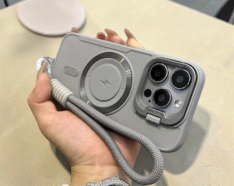 Custodia magnetica per iPhone con protezione per la fotocamera a ribalta e cinturino da polso.