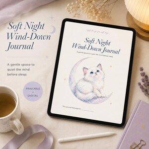 May include: A digital tablet displaying a Soft Night Wind-Down Journal with a white kitten sitting on a crescent moon illustration. The screen text reads Soft Night Wind-Down Journal, A gentle space to quiet the mind before sleep, and This journal belongs to.