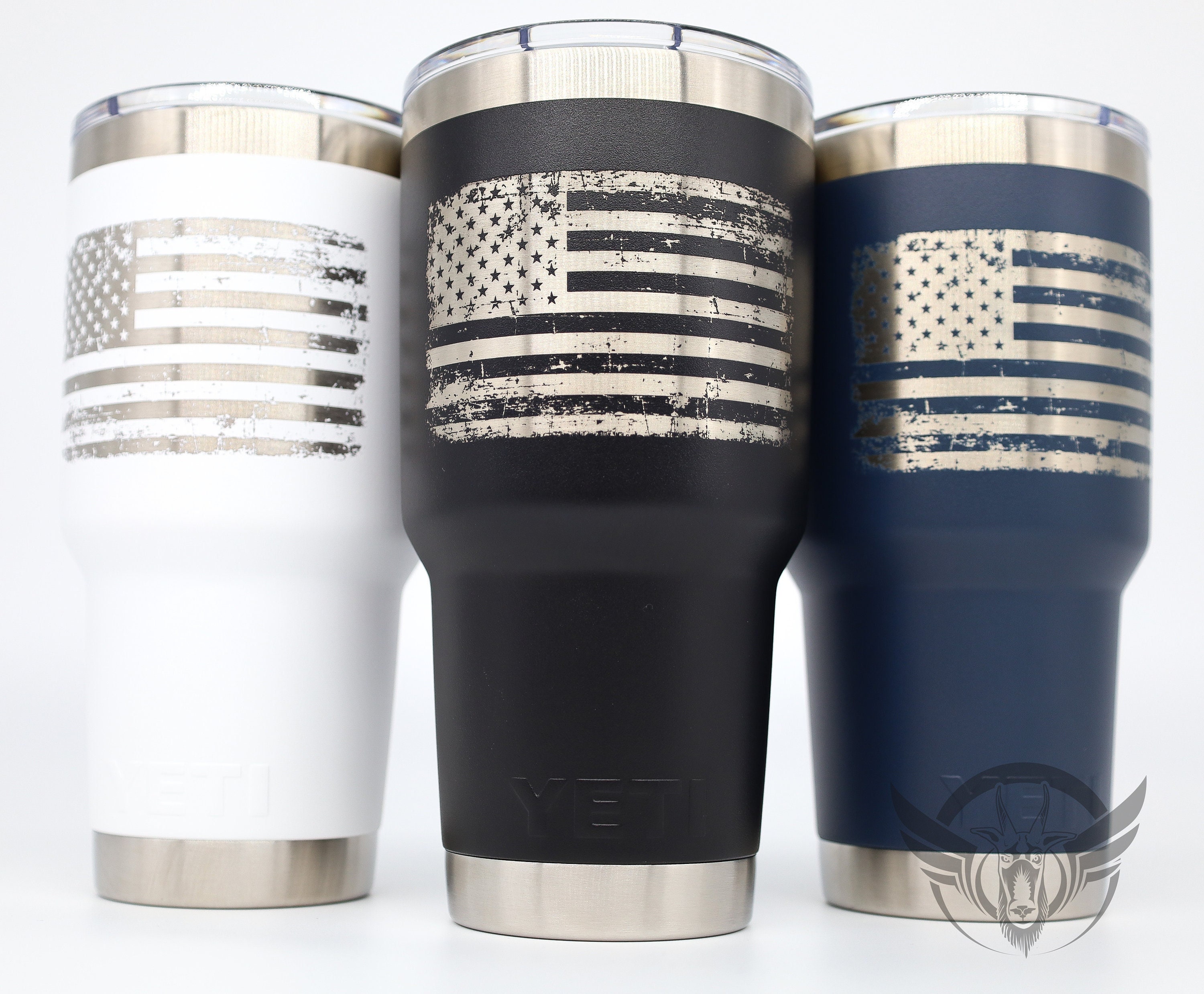 Distressed American flag laser etched on 30 oz Yeti tumblers. YETI