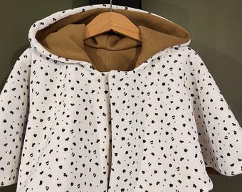 Omkeerbare poncho/cape
