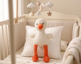 Suave patito de peluche para la decoración de la habitación del bebé, ideal para abrazar.