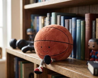 Peluche de baloncesto: un suave y abrazable adorno para los aficionados al deporte.