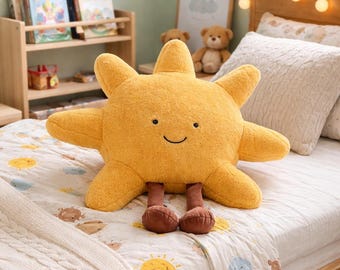 Almohada de peluche con forma de sol