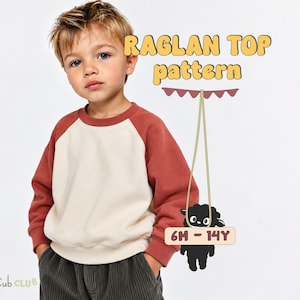 May include: A long-sleeve raglan top with a cream-colored torso and rust-colored sleeves. The image features the text RAGLAN TOP pattern and a graphic of a black sheep holding a sign that reads 6M - 14Y, with the brand name Cub CLUB.