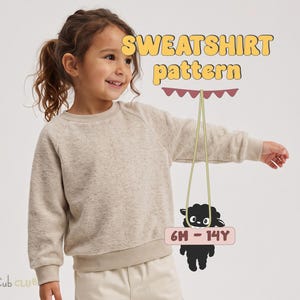 May include: A beige long-sleeve sweatshirt with a crew neckline and ribbed cuffs. The image includes text reading SWEATSHIRT pattern, a graphic of a black sheep, and the text 6M - 14Y, indicating the available size range.