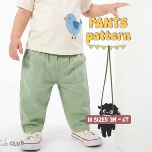 May include: Sage green trousers with two front pockets, worn with a cream t-shirt featuring a blue bird appliqué. Text on the image reads: PANTS pattern, 10 SIZES: 3M - 6T, and CUB CLUB. A black sheep graphic hangs from a green string.