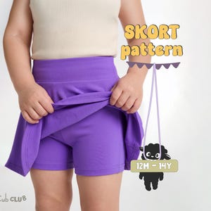 May include: A solid purple skort featuring a high waistband and an integrated short layer. The image includes the text SKORT pattern and a graphic of a black sheep holding a sign that reads 12M - 14Y, along with the text Cub CLUB in the corner.