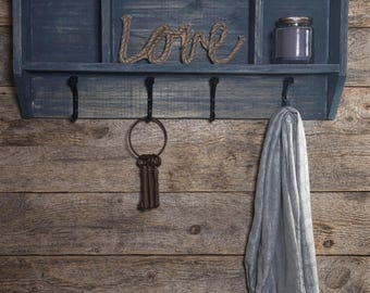 Rustic Pine Shelf with Cubbies and Railroad Tie Style Hooks