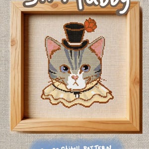 May include: Cross-stitch pattern of a cat named "Sir Tabby" wearing a top hat and ruffled collar, framed in a wooden square. The cat is gray and white with blue eyes. The text "Cross-stitch Pattern" is below the image.