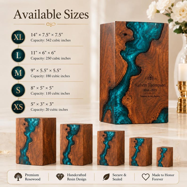May include: A collection of five rectangular wooden cremation urns featuring a natural wood grain and a central river-like inlay of translucent teal resin. The largest urn is engraved with the name Robert Thompson and the years 1948-2023.