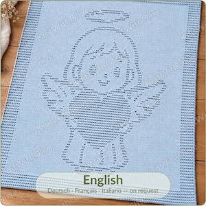 May include: A light blue knitted blanket featuring a central graphic of an angel holding a heart. The design is created with a textured stitch pattern, and the blanket has a wide, uniform border. The text "English" is printed at the bottom.