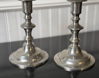 vintage pair of pewter candlestick holders