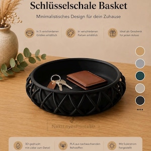 Könnte beinhalten: Ein runder schwarzer Korb mit einer gitterartigen Außenwand. Im Inneren des Korbs befinden sich ein braunes Lederportemonnaie und ein Schlüsselbund aus Metall. Der Text "Schlüsselschale Basket" und "NextLayerPrints3D" ist zu sehen.