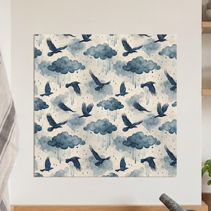 May include: Square artwork featuring a repeating pattern of dark blue crows, rain, and clouds on a cream background. The watercolor style design has a whimsical feel. The crows are in various poses, some flying, others perched.