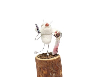 bear in a hat on the phone holding a bag and eating a donut (high level multitasking), felted creature miniature - tiny stump diorama