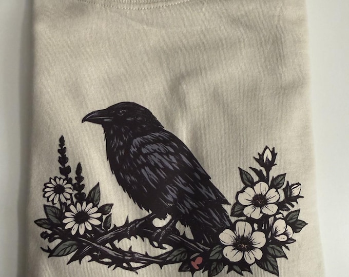 Still Becoming Raven Floral T-Shirt – Custom Graphic Tee