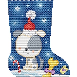 May include: A blue and white Christmas stocking with a cute dog wearing a Santa hat. The stocking has a red band at the top with the name "MAX" written on it.
