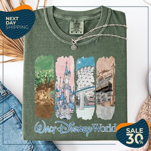 The image is an advertisement for a t-shirt featuring a collage of Disney World landmarks, including the Walt Disney World resort, the Tree of Life, the Epcot Space Needle, and the Hollywood Hills. The t-shirt is displayed on a white background, and there are two sale offers: a 30% discount and next day shipping.